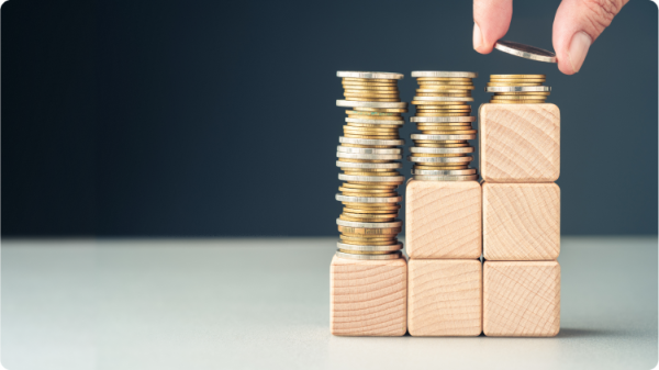 coin stacked on wooden cubes